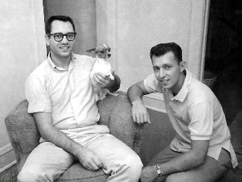 Two young men and a small dog, early 1960s