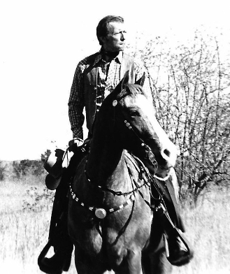 Larry G. Sanders on horseback